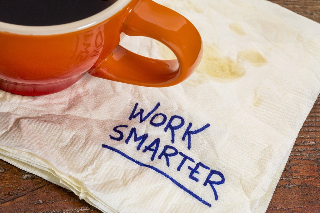 work smarter advice - handwriting on  a napkin with cup of coffee