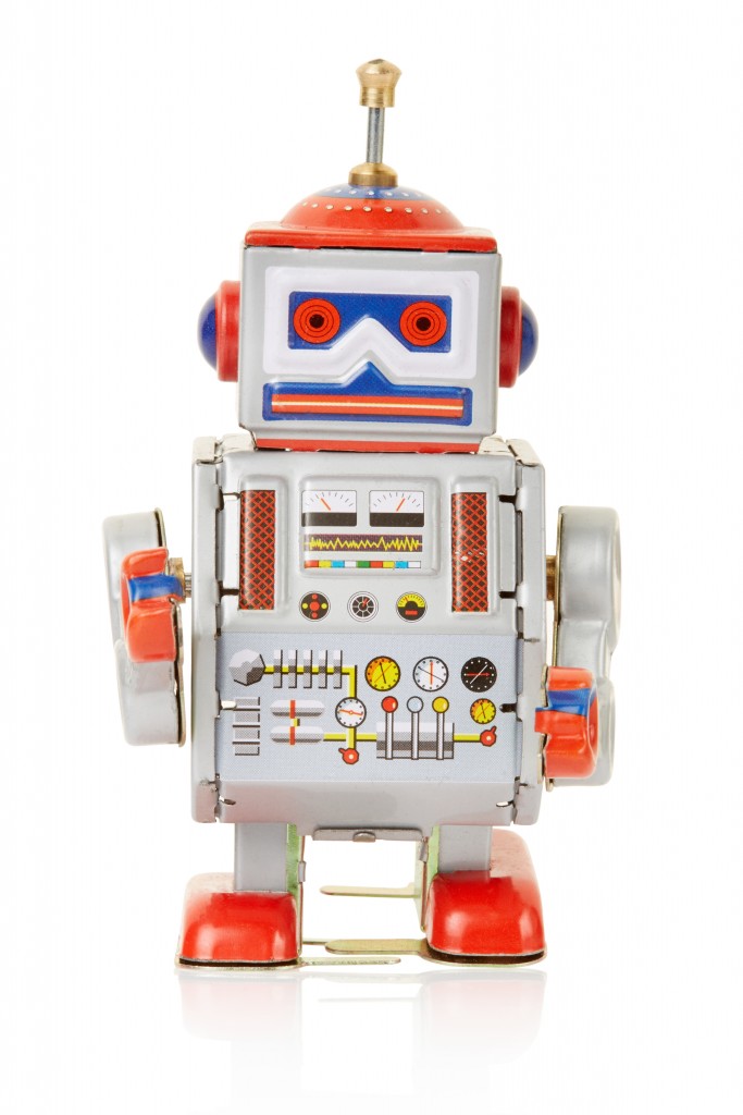 Robot vintage toy isolated on white, clipping path included